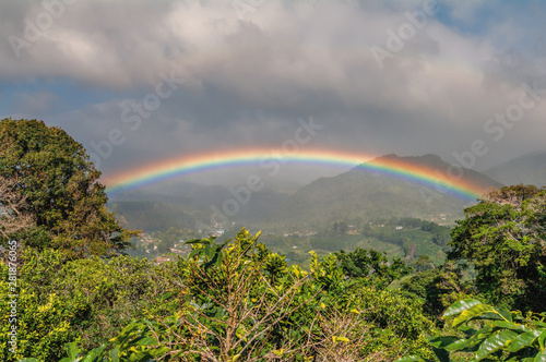 Fototapeta Naklejka Na Ścianę i Meble -  Vibrant rainbow tropical rainy sky Panama