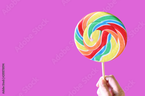Colorful Lollipop on a Pink Background