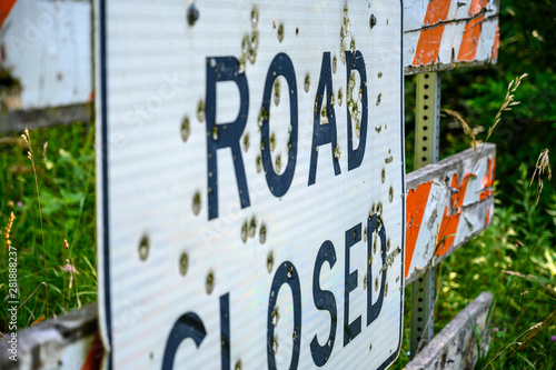 Canvas Print Buckshot road closed sign in front of a washed out bridge