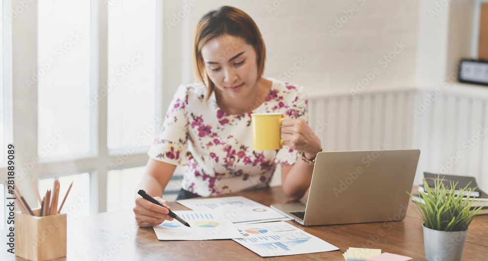 Beautiful businesswoman working on her project Beautiful businesswoman working on her project