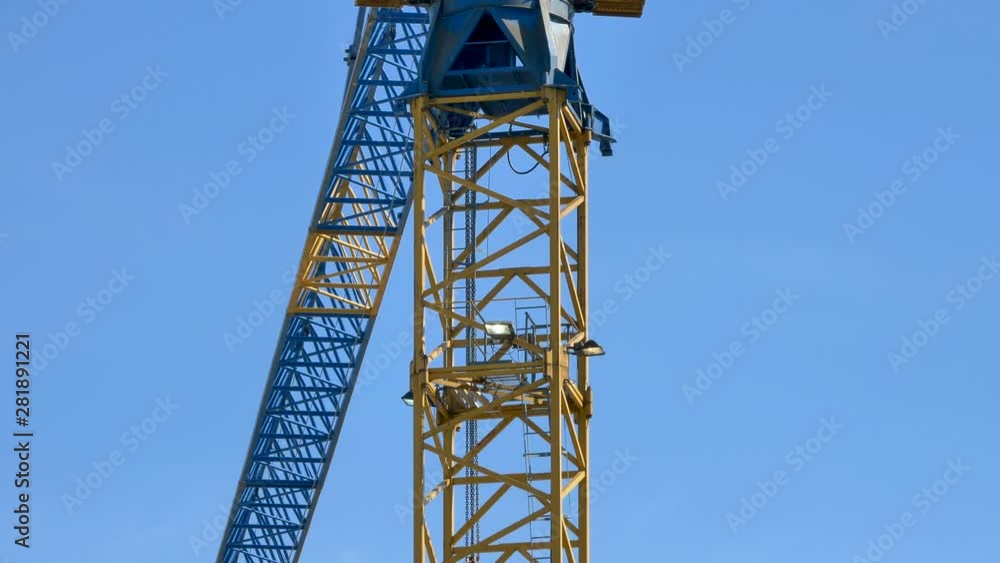 The closer look of the yellow metal bars of the crane The closer look of the yellow metal bars of the crane