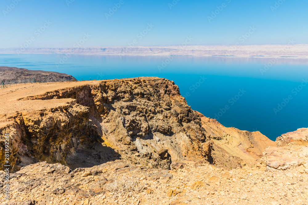View from the Zara trail, near the Panorama Dead Sea Complex in Jordan. Zara  Cliff Walk offers stunning views of the Dead Sea coast. Stock Photo | Adobe  Stock