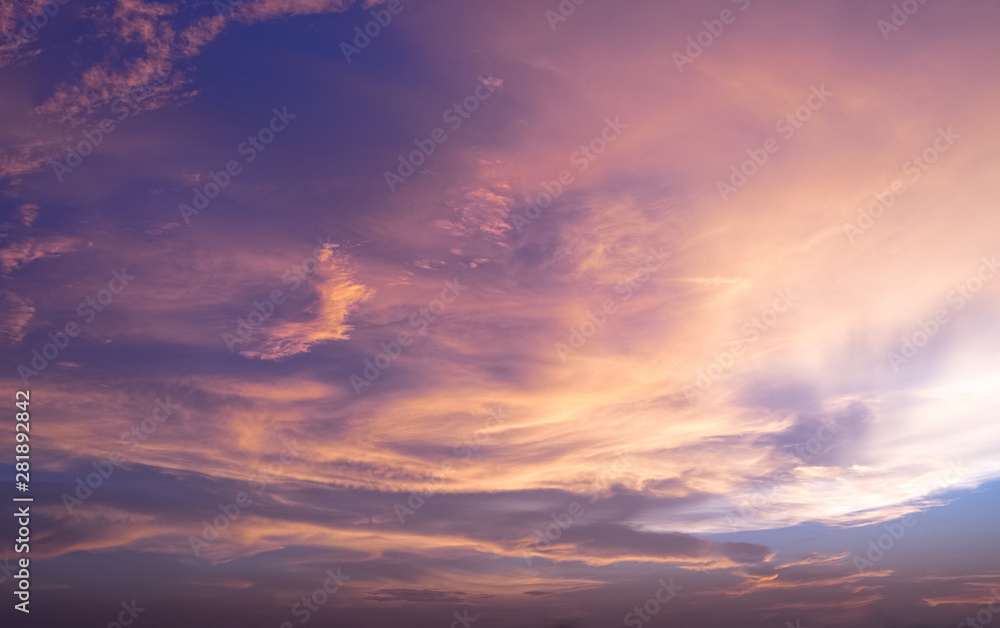 Fiery sunset twilight sky orange, blue, purple colors. Peaceful beautiful sky. - Image