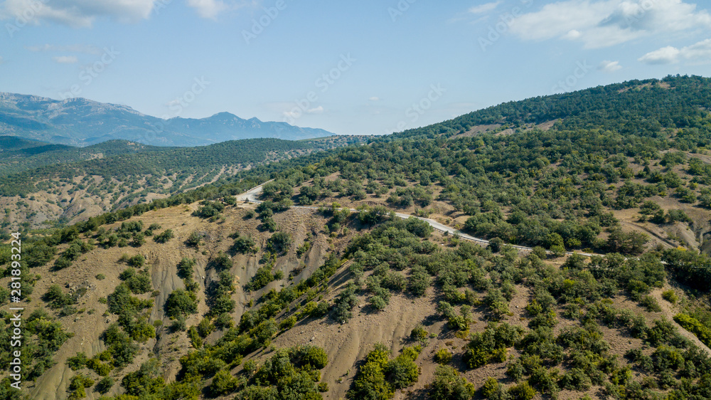 Obraz premium Crimea trip: view from drone of curvy mountain road