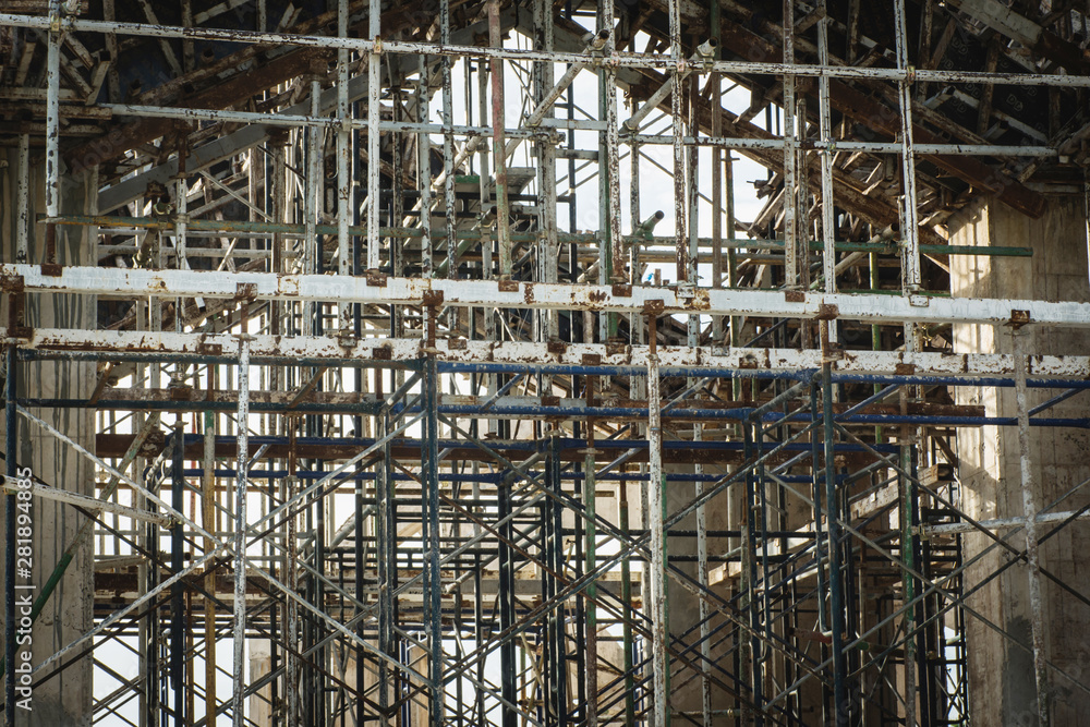  Scaffolding and steel in construction site.