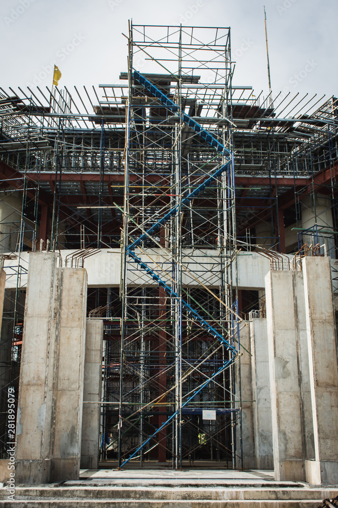  Scaffolding and steel in construction site.