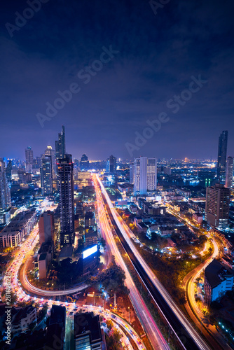 night vertically cityscape of bangkok amazing view of taksin bridge photo