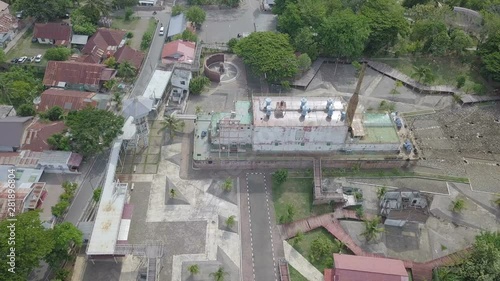 Aerial shot of PLTD Apung Ship which was swept up by Tsunami and carried far inland to village photo