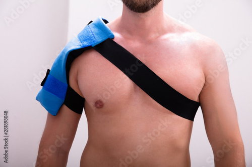 Man With A Ice Pack On His Shoulder