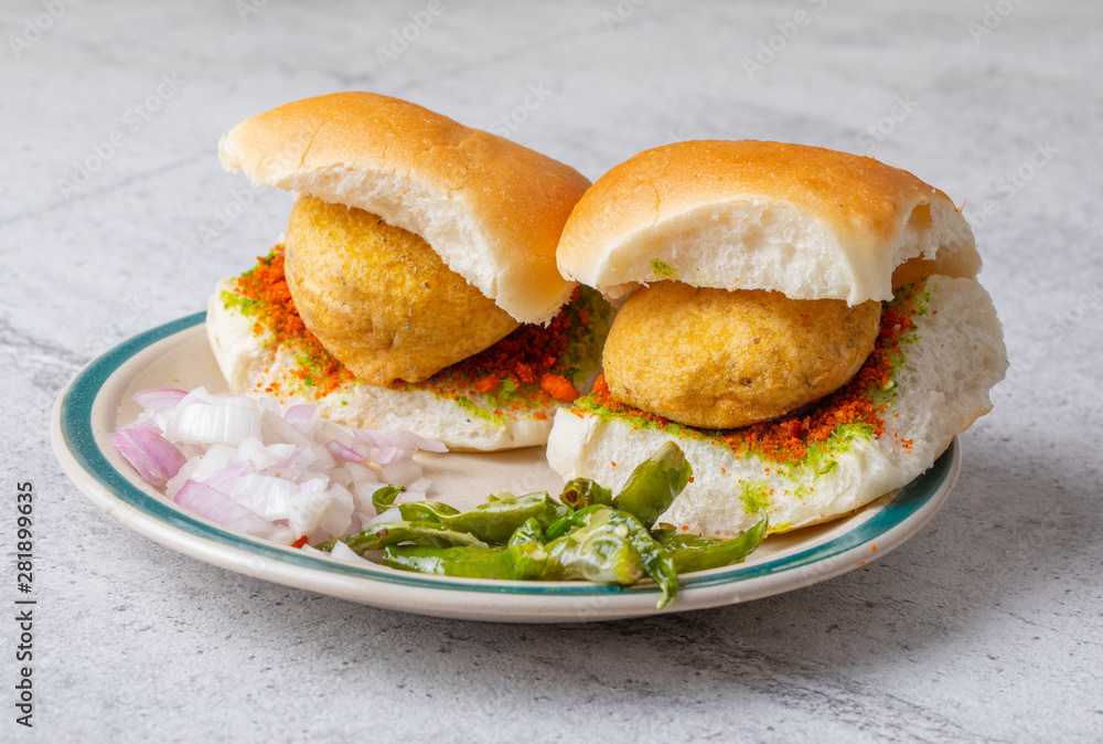 Indian Famous Street Food Vada Pav Also Know as Vada Paav, Wada Pav or Wada Pao is a Vegetarian Fast Food Dish From Maharashtra Indian Famous Street Food Vada Pav Also Know as Vada Paav, Wada Pav or Wada Pao is a Vegetarian Fast Food Dish From Maharashtra