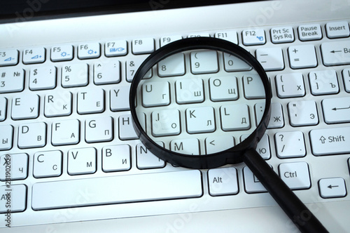 magnifying glass on the keyboard