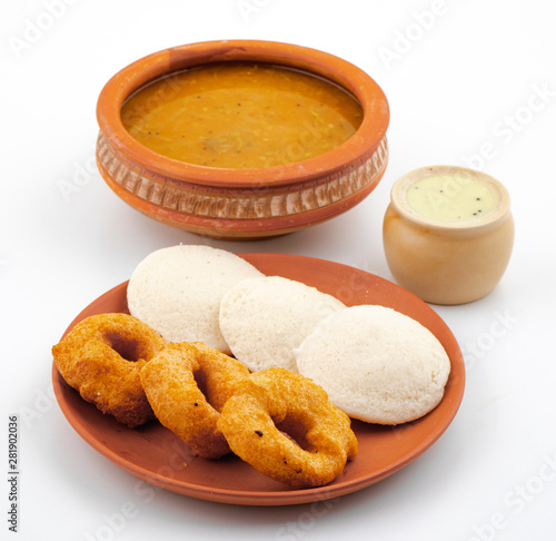 South Indian Popular Breakfast Idli Vada Served With Sambar And Coconut Chutney Also Know as Vadai, Vade, Idly or Medu Vada photo