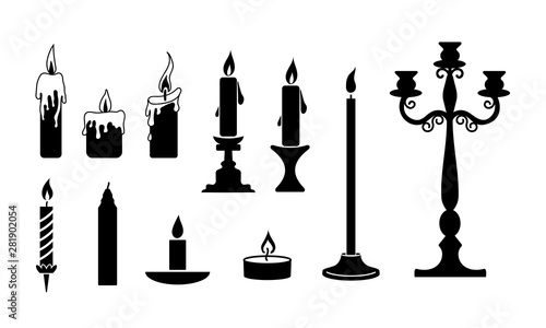 Set of burning candles and candlesticks on white background. Glowing fire and flowing down wax. Vector flat design illustration for card, christmas, party, invitation, decoration, birthday.