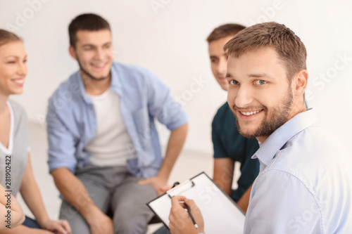 People at group therapy ses...