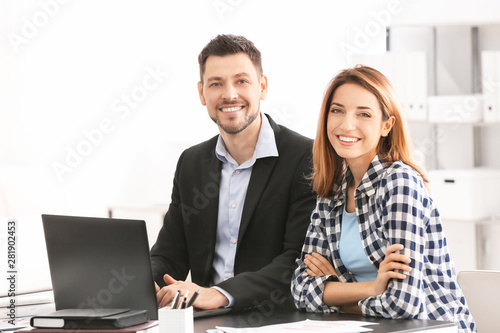 Businessman consulting youn...