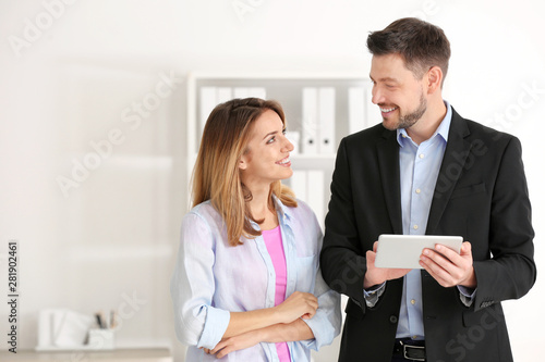 Businessman consulting youn...