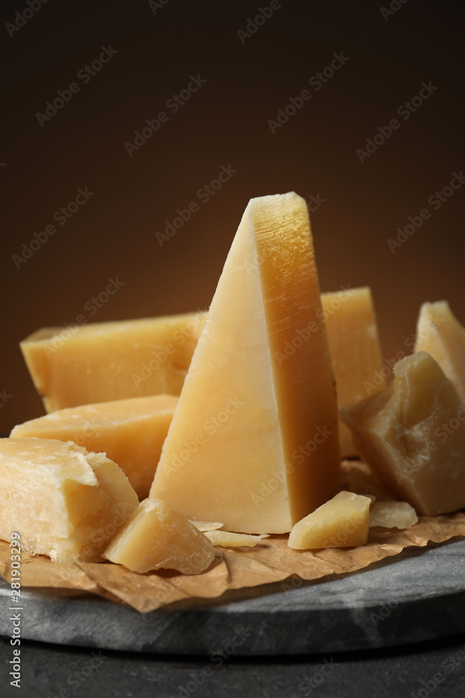 Fototapeta premium Marble board with delicious cheese on table