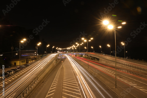 Night road with illumination in modern city