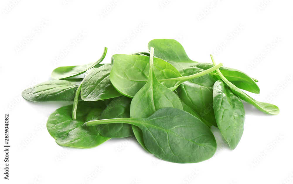Pile of fresh green healthy baby spinach leaves on white background Pile of fresh green healthy baby spinach leaves on white background