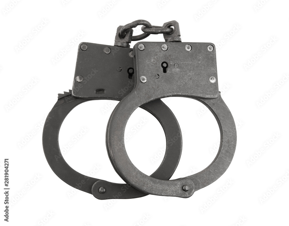 Black metallic handcuffs isolated on white Black metallic handcuffs isolated on white