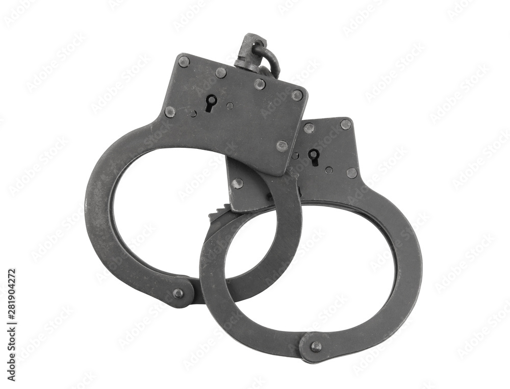 Black old metallic handcuffs isolated on white background Black old metallic handcuffs isolated on white background