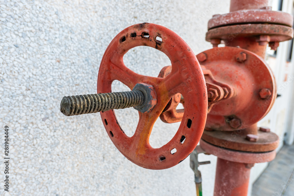 manual red hand wheel valve of a fire prevention system with pipe and bolts manual red hand wheel valve of a fire prevention system with pipe and bolts