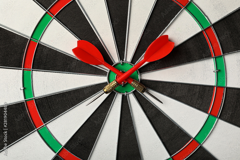 Red arrows on dart board, top view