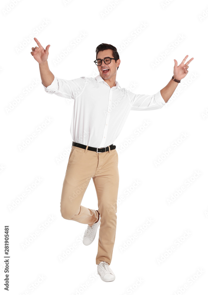 Handsome young man with glasses dancing on white background Handsome young man with glasses dancing on white background
