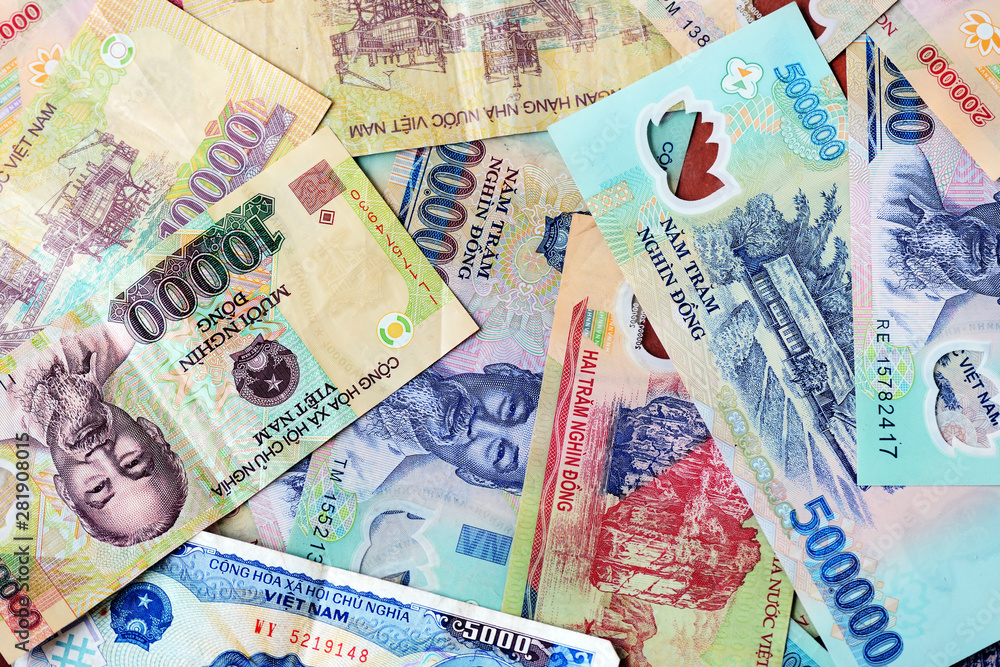 Various Vietnamese dong banknotes close-up. Money background