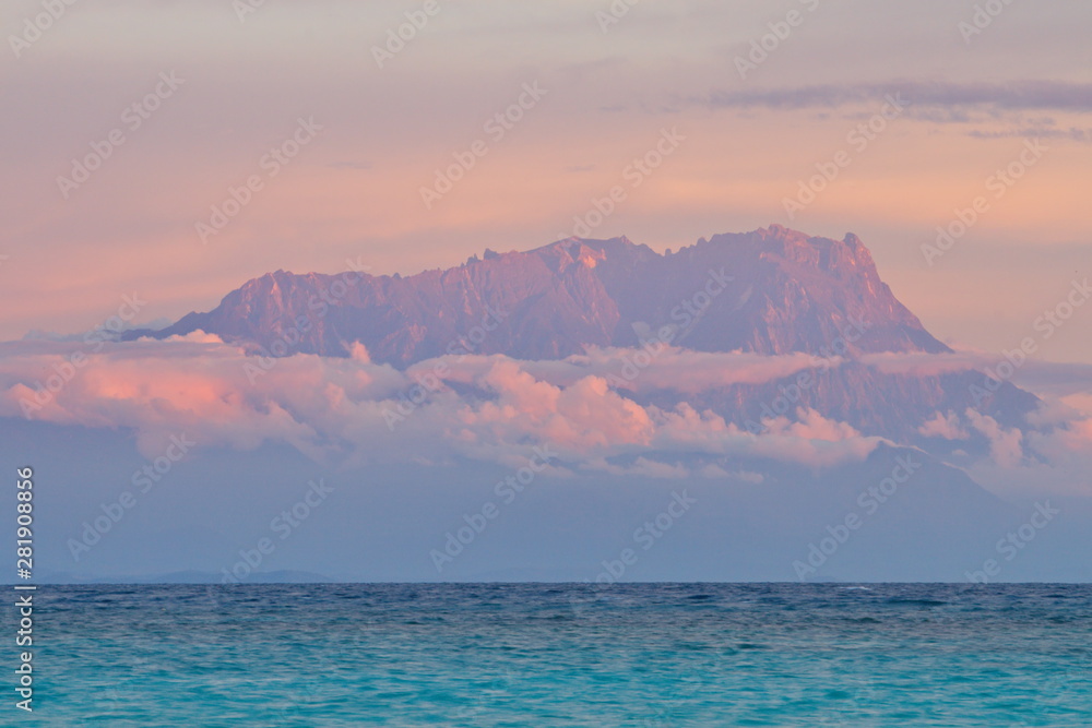 Majestic mount Kinabalu view from Mantanani island, Sabah Malaysia. Mt Kinabalu is the highest peak in Southern Asia. Majestic mount Kinabalu view from Mantanani island, Sabah Malaysia. Mt Kinabalu is the highest peak in Southern Asia.