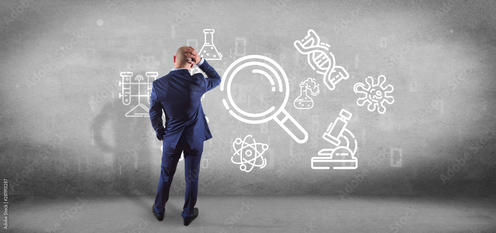 View of a Businessman holding a cloud of science icon View of a Businessman holding a cloud of science icon