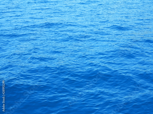 A deep blue sea water texture view from top