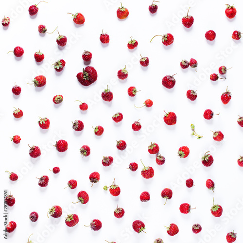 Scattered strawberry isolated on white. Organic berry