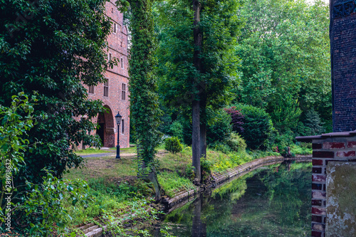 water gate with tower and city wall summer green photo