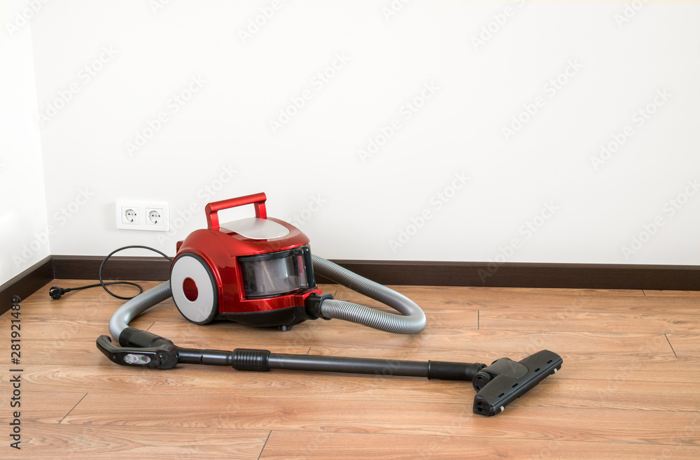 vacuum cleaner is standing on the floor vacuum cleaner is standing on the floor