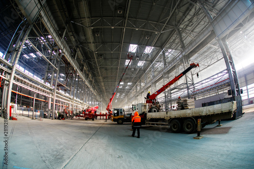 Production warehouse. Installation work in the production room. photo