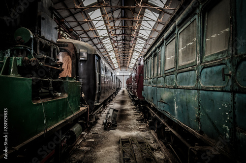 Vintage railway engines and cartridges in a shed