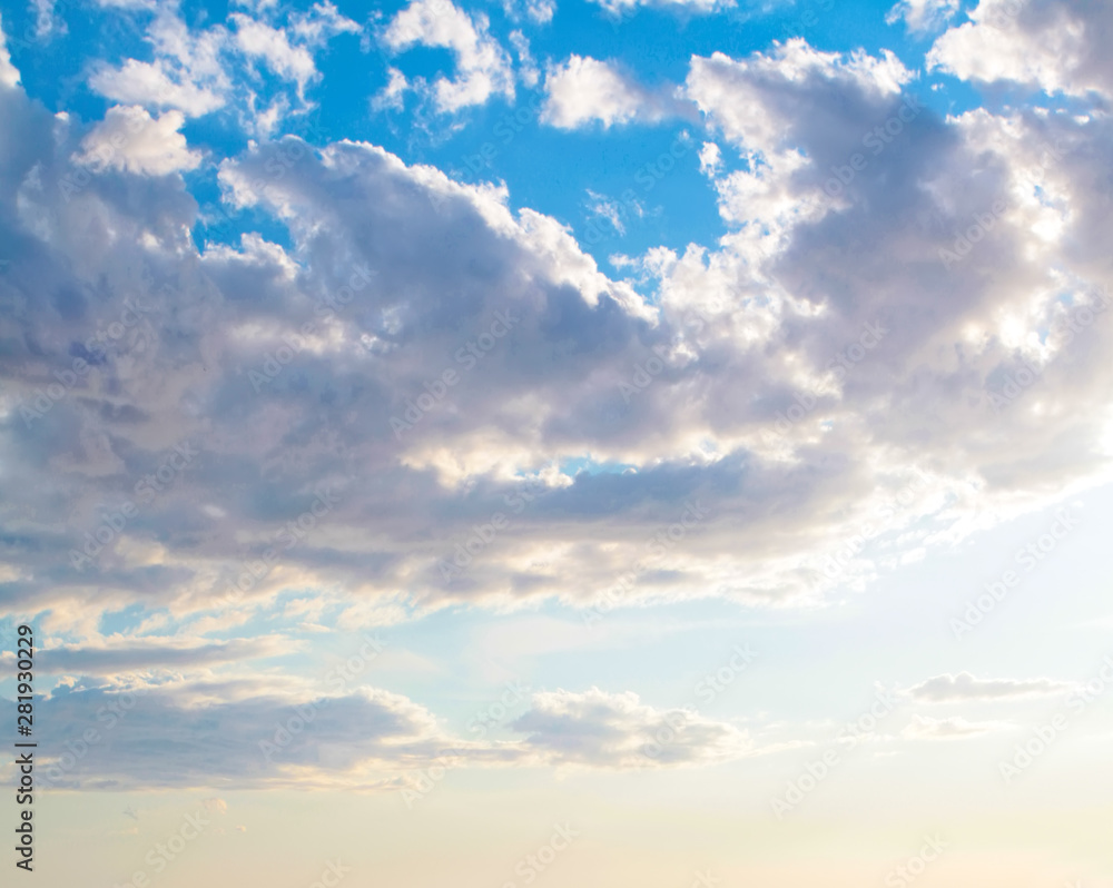 Fototapeta premium Blue sky clouds background. Beautiful landscape with clouds and sun