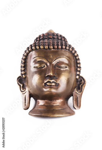 Old Buddha mask made of metal © Dymov