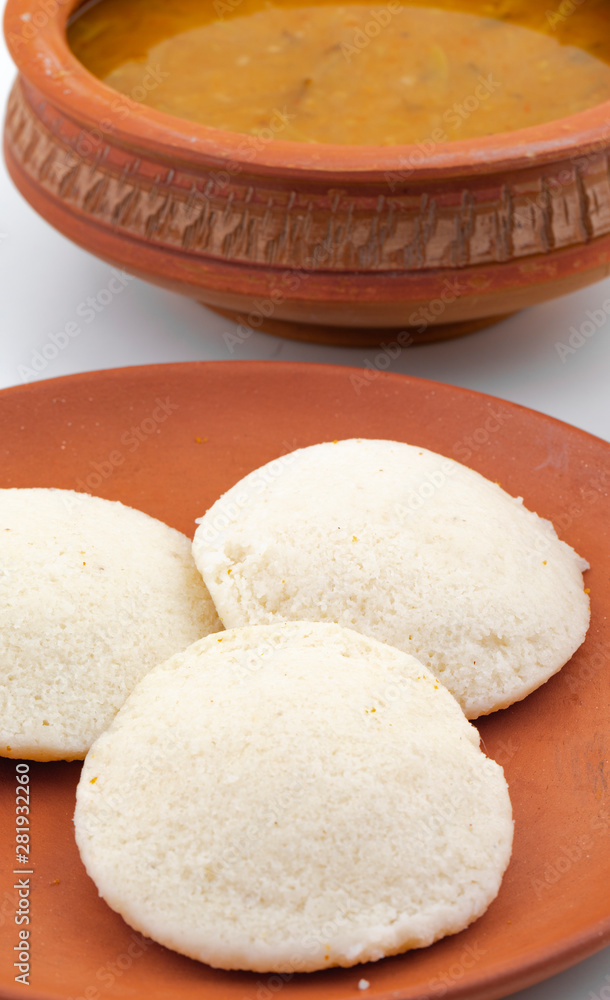 South Indian Popular Breakfast Idli or Idly Served With Sambar And Coconut Chutney South Indian Popular Breakfast Idli or Idly Served With Sambar And Coconut Chutney