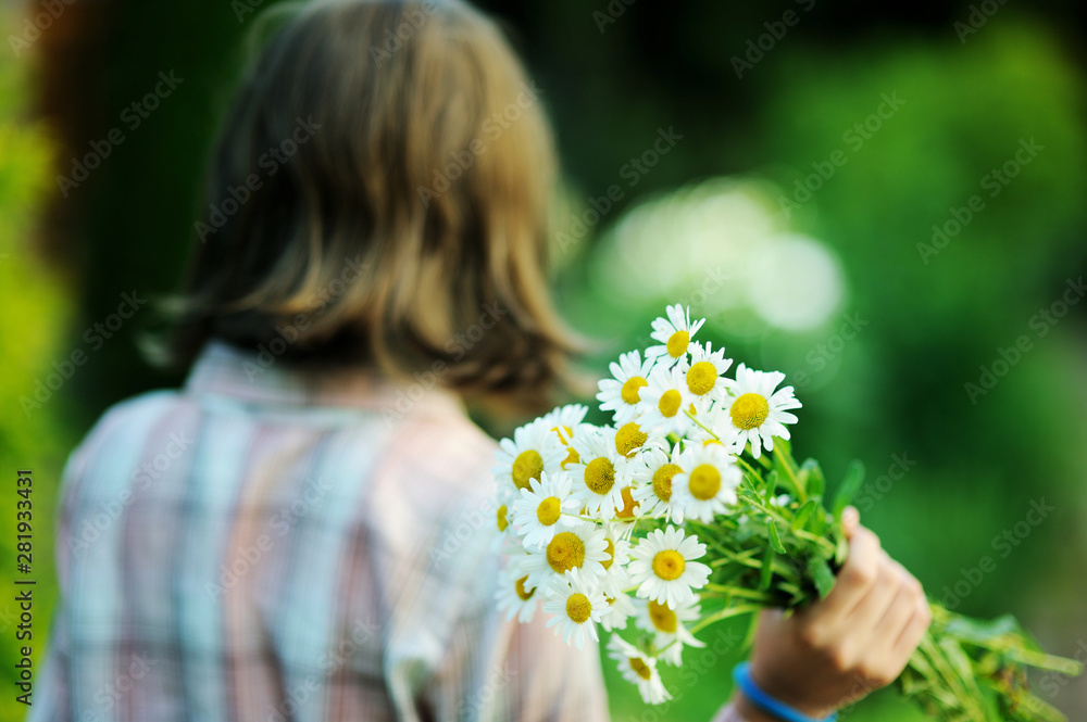 Portrait teenage with bouquet of daisies Portrait teenage with bouquet of daisies