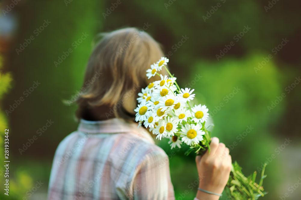 Portrait teenage with bouquet of daisies Portrait teenage with bouquet of daisies