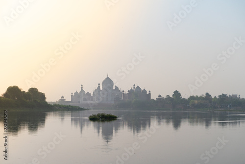 Fototapeta Naklejka Na Ścianę i Meble -  The view on Taj Mahal from river side