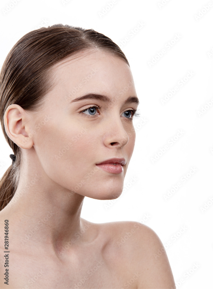 Young girl's face on white isolated background