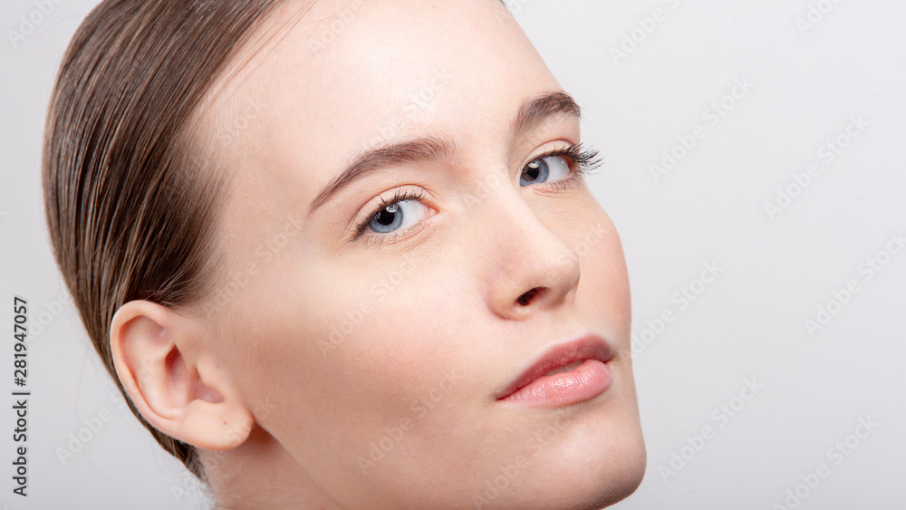 Close-up of the Girl, with very beautiful features, on a white isolated background