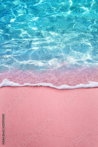 tropical pink sandy beach and clear turquoise water