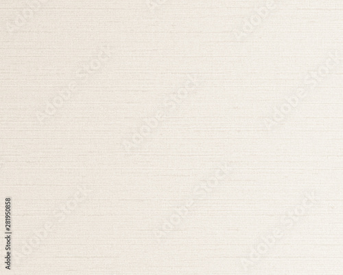 Woven cotton linen fabrics textile textured background in light cream beige color tone