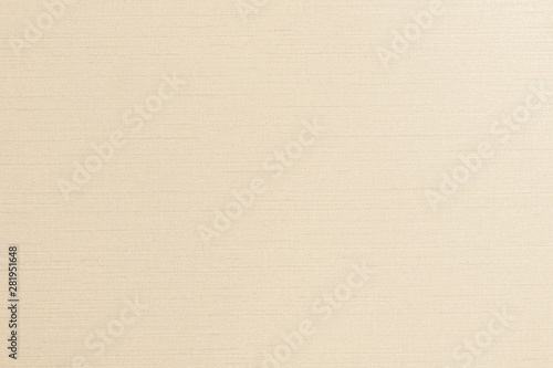 Beige cotton silk fabric textile wallpaper texture pattern background in light yellow cream beige pastel color .
