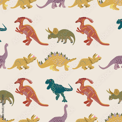 Coloured dinosaurs seamless pattern on beige background