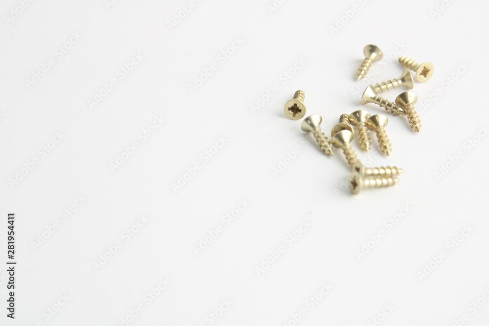 golden star screws, in colorful background golden star screws, in colorful background